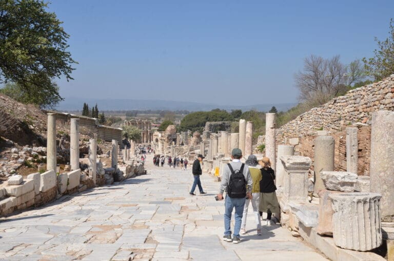 Marble street in Ephesus Ancient City with visitors walking