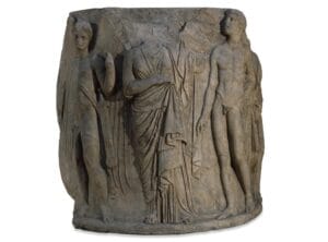 Relief sculpture on a marble column drum from the later Temple of Artemis at Ephesus, featuring ancient mythological figures carved in stone.