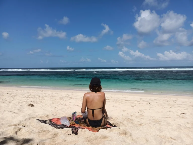 Woman relaxing on Pamucak Beach near Kusadasi