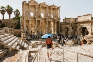 Visitors exploring the Library of Celsus in Ephesus Ancient City Turkey